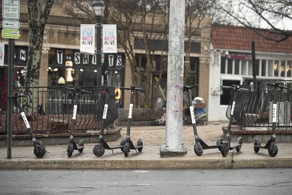 Bird Scooters sit parked on the sidewalk of Euclid Avenue NE in Atlanta’s Little Five Points community, Friday, Jan. 4, 2019. (ALYSSA POINTER/ALYSSA.POINTER@AJC.COM)