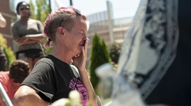 A woman cries during a vigil for the victims of the mass shooting that occurred over night, at the Levitt Pavilion on August 4, 2019, in Dayton, Ohio. In the second mass shooting in the U.S. within 24 hours a gunman left nine dead and another 27 wounded after only a minute of shooting. (Photo by Matthew Hatcher/Getty Images)