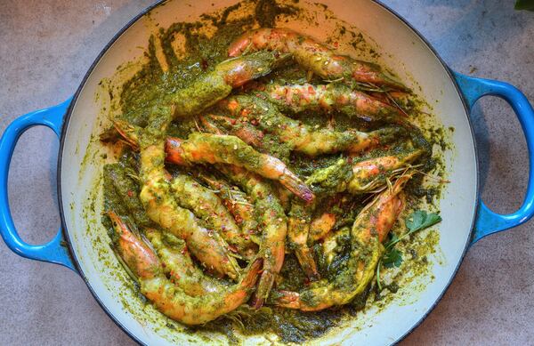 Chef Asha Gomez, who was born and raised in Kerala, India, prepared this Green Masala Shrimp. STYLING BY ASHA GOMEZ / CONTRIBUTED BY CHRIS HUNT