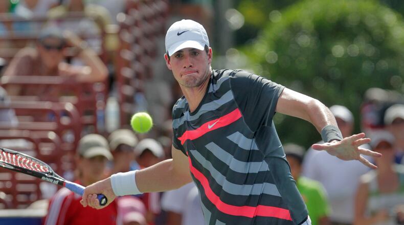 John Isner will return to play the Truist Atlanta Open this year. Bob Andres bandres@ajc.com