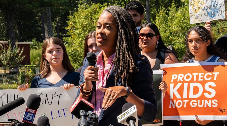 State Sen. Nikki Merritt spoke at a rally at J.B. Williams Park on Sept. 20, 2024. Hundreds of Georgia students walked out of class that morning to hold moments of silence for the victims of the Apalachee High School shooting in Winder, and to pressure state leaders to do more to curb gun violence. (Olivia Bowdoin for the AJC).