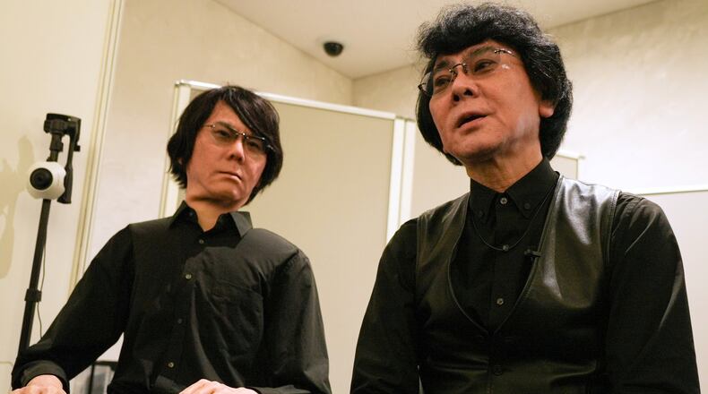 Professor Hiroshi Ishiguro, right, of Osaka University talks to android robot Geminoid at the Humanoids Summit 2026 in Tokyo, Thursday, May 28, 2026. (AP Photo/Ayaka McGill)
