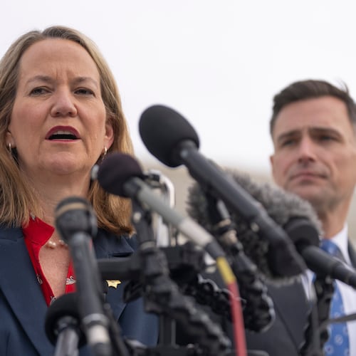 Arizona Attorney General Kris Mayes speaks to reporters as Oregon Attorney General Dan Rayfield listens outside the Supreme Court on Wednesday, Nov. 5, 2025, in Washington. (AP Photo/Mark Schiefelbein)