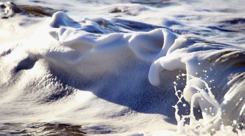 A closeup on waves hitting the beach from the Pacific Ocean.  (Photo: Bruce Bennett/Getty Images)