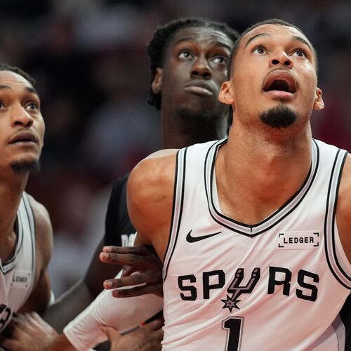San Antonio Spurs forward/center Victor Wembanyama (1) and Portland Trail Blazers guard Sidy Cissoko watch for the rebound during the second half in Game 4 of a first-round NBA basketball playoffs series in Portland, Ore., Sunday, April 26, 2026. (AP Photo/Jenny Kane)