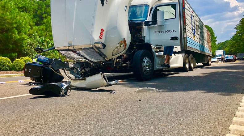 A retired police officer is in serious condition after he was hit by a tractor-trailer.