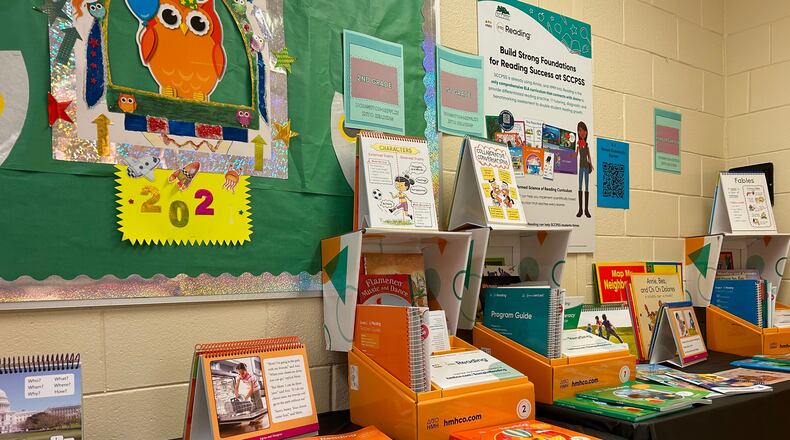English language arts (ELA) textbooks from publisher Houghton Mifflin Harcourt sit on display at Savannah's Leiston Shuman Elementary School ahead of a community curriculum review opportunity on Thursday Nov. 16, 2023.