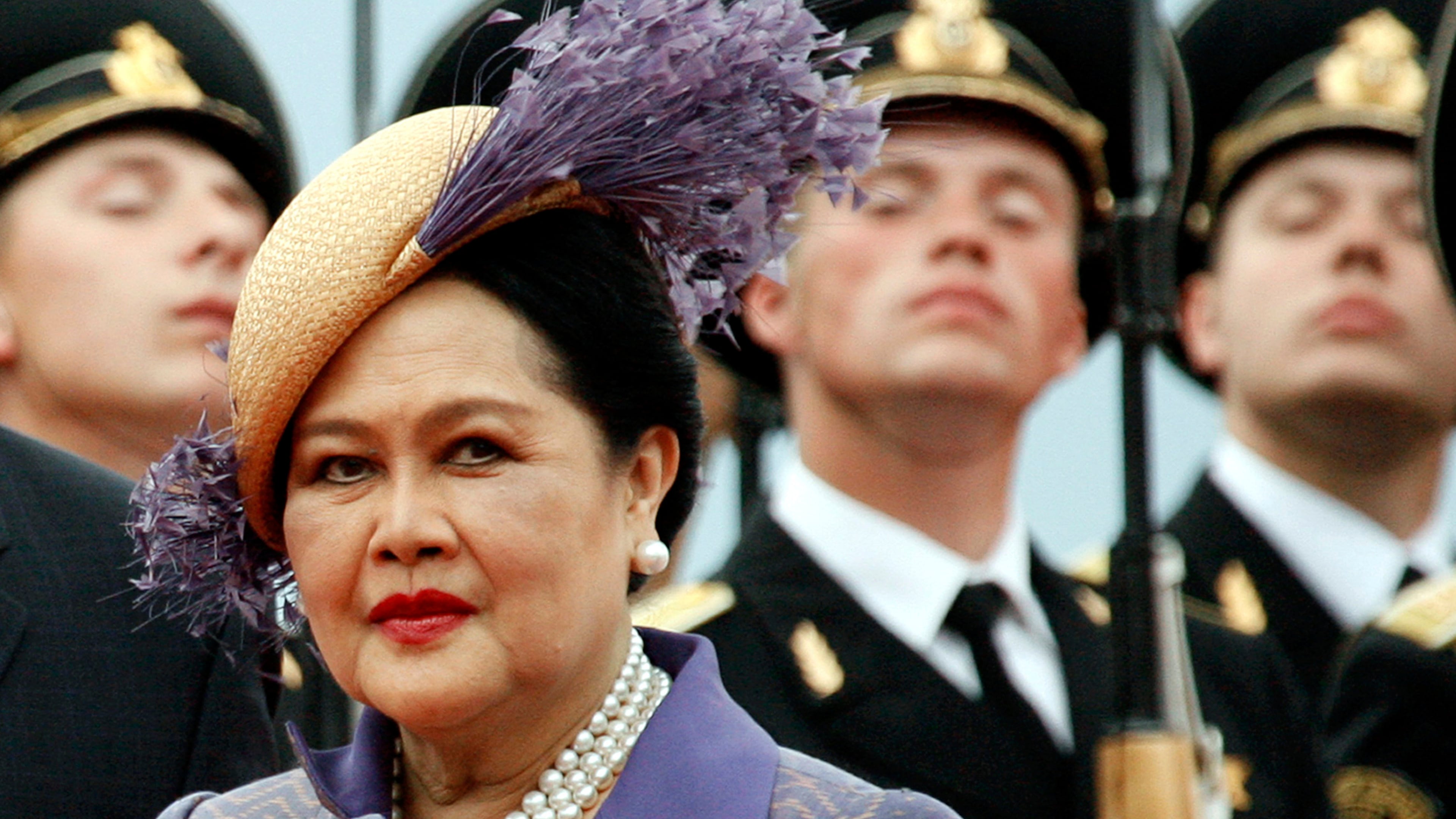 FILE - Queen Mother Sirikit passes by Russian honor guards while arriving in Moscow Vnukovo airport, July 2, 2007. (AP Photo/Misha Japaridze, File)