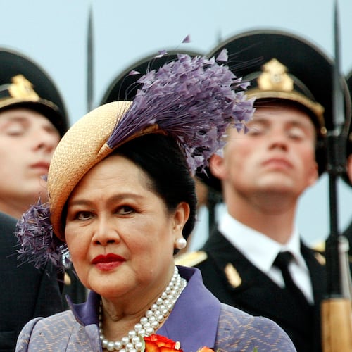 FILE - Queen Mother Sirikit passes by Russian honor guards while arriving in Moscow Vnukovo airport, July 2, 2007. (AP Photo/Misha Japaridze, File)