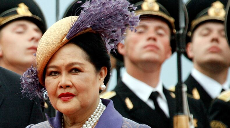 FILE - Queen Mother Sirikit passes by Russian honor guards while arriving in Moscow Vnukovo airport, July 2, 2007. (AP Photo/Misha Japaridze, File)