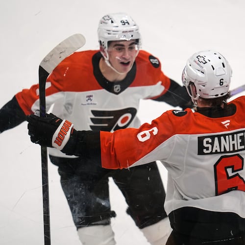 Philadelphia Flyers' Travis Sanheim (6) celebrates with Porter Martone (94) after scoring during the third period of Game 1 in the first round of the NHL Stanley Cup playoffs against the Pittsburgh Penguins in Pittsburgh, Saturday, April 18, 2026. (AP Photo/Gene J. Puskar)