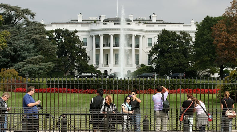 Tourists visit the south side of the White House in Washington, DC. The Secret Service said that the south sidewalk will be off-limits to tourists from now on.