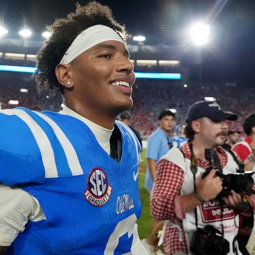Mississippi quarterback Trinidad Chambliss (6) celebrates his team's win over LSU during an NCAA college football game in Oxford, Miss., Saturday, Sept. 19, 2026. (AP Photo/Rogelio V. Solis)