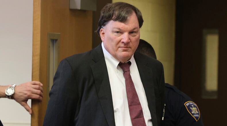 FILE - Rex Heuermann appears in Judge Timothy Mazzei's courtroom at Suffolk County Court in Riverhead, N.Y., for a status conference, Feb. 25, 2025. (James Carbone/Newsday via AP, File)