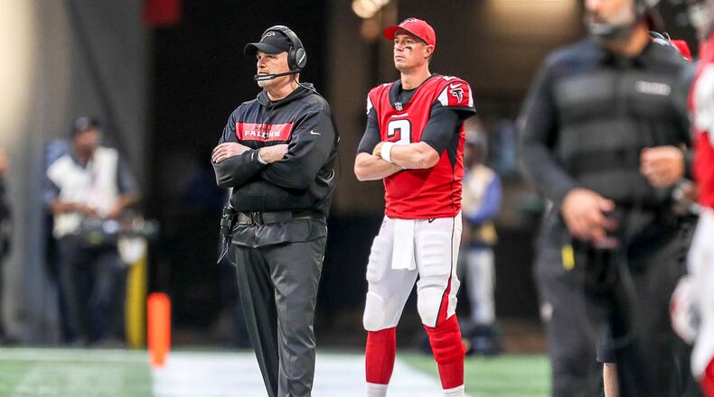 Falcons coach Dan Quinn and quarterback Matt Ryan (2) watch the defense play during the second half of the game at Mercedes-Benz Stadium in Atlanta, Sunday, December 2, 2018. (ALYSSA POINTER/ALYSSA.POINTER@AJC.COM)