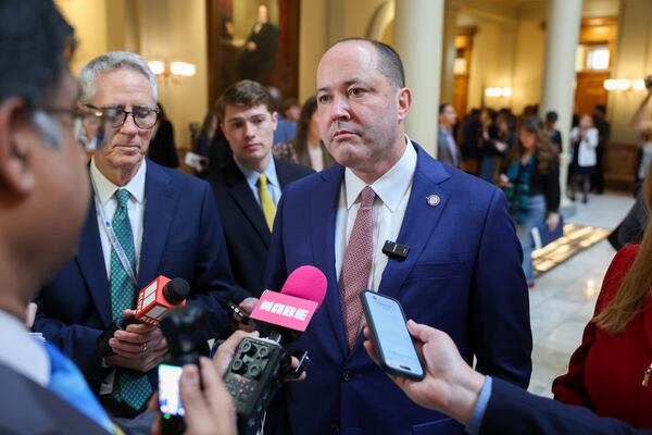 Attorney General Chris Carr, a Republican candidate for governor, speaks to media while waiting to file paperwork to run for election at the Capitol earlier this month. (Arvin Temkar/AJC)