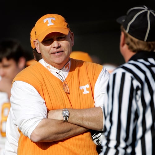 FILE - Tennessee head coach Phillip Fulmer questions a referee about a call in the fourth quarter of a college football game against Vanderbilt in Nashville, Tenn., on Nov. 18, 2006. (AP Photo/Mark Humphrey, File)
