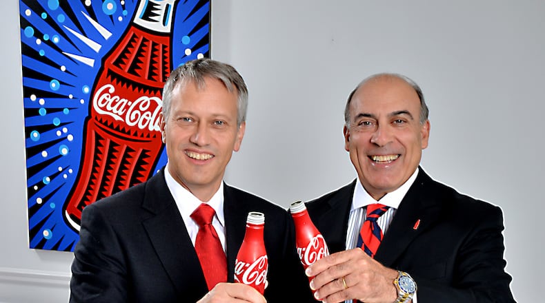 Muhtar Kent (right), Coca-Cola’s chief executive officer and chairman, and Coca-Cola President James Quincey, who will soon be stepping in as CEO, both got big raises last year despite lower profits. Photo: Coca-Cola.