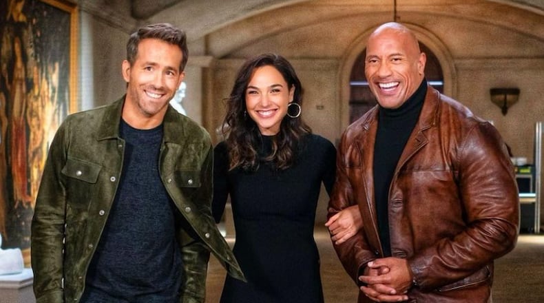 Upcoming Netflix thriller "Red Notice," largely shot in Atlanta, stars Ryan Reynolds, Gal Gadot and Dwayne "The Rock" Johnson. NETFLIX