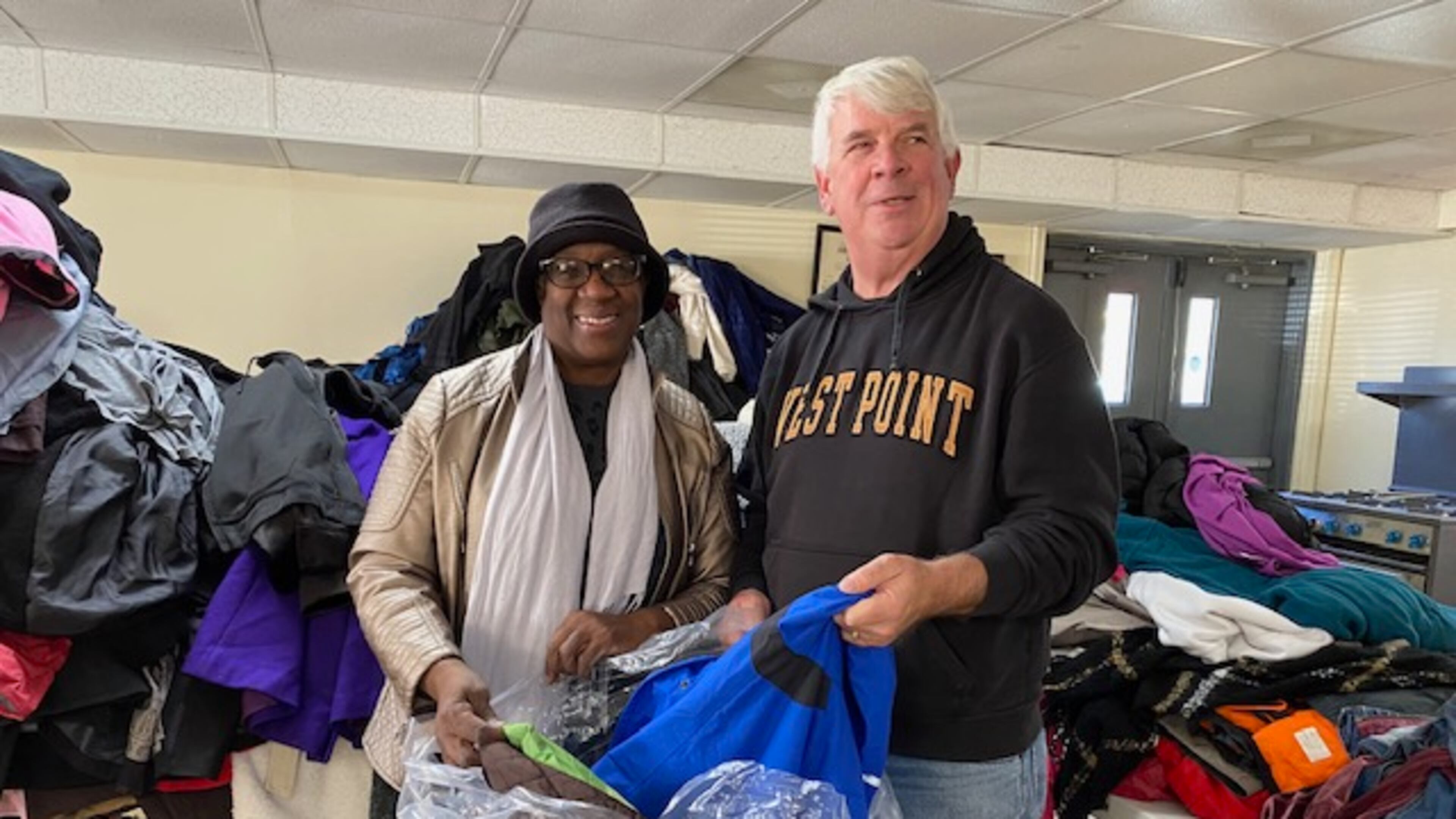 Cherokee County Homeless Veterans Program founder Jim Lindenmayer helps pack the thousands of new and gently used coats donated to the program. The coats are given away to homeless veterans and to local schools. (Courtesy of Jim Lindenmayer)