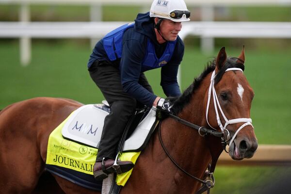 Kentucky Derby favorite Journalism works out at Churchill Downs.