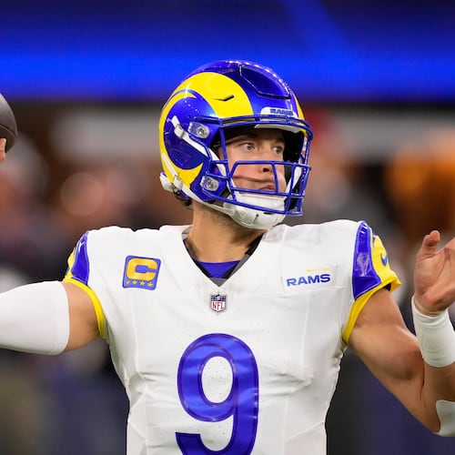 Los Angeles Rams quarterback Matthew Stafford passes against the Tampa Bay Buccaneers during the first half of an NFL football game, Sunday, Nov. 23, 2025, in Inglewood, Calif. (AP Photo/Mark J. Terrill)