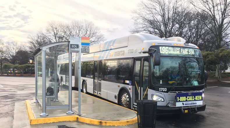 A MARTA bus waits for passengers at its Southlake Mall stop in Clayton County.