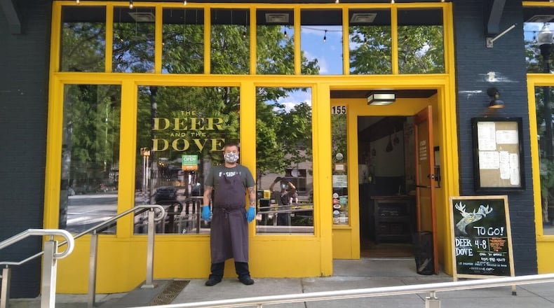 Terry Koval, chef and co-owner of the Deer and the Dove and B-Side on Decatur Square, has kept his restaurants open with takeout service during the COVID-19 pandemic. The work schedule, though, is “brutal,” he said. LIGAYA FIGUERAS / LIGAYA.FIGUERAS@AJC.COM