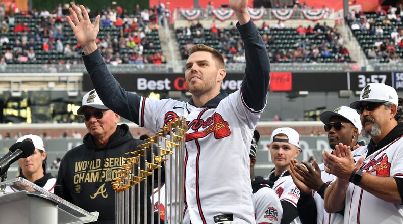 Braves first baseman Freddie Freeman waves to fans during the World Series celebration at Truist Park. (Hyosub Shin / Hyosub.Shin@ajc.com)