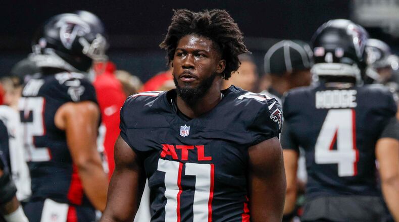 Falcons linebacker Jalon Walker leaves the field before their game against the Seattle Seahawks at Mercedes-Benz Stadium on Sunday, Dec. 7, 2025, in Atlanta. Walker exited Tuesday’s training camp practice after sustaining an injury. (Miguel Martinez/AJC)