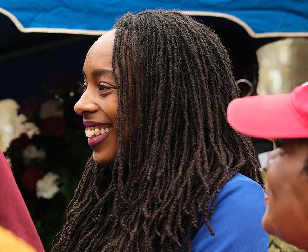 Alyse Minter, a descendent of Harriet Powers, attends the dedication of a new headstone for Harriet and Armstead Powers at the Gospel Pilgrim Cemetery in Athens in 2023. For nearly two decades, Minter has worked to trace and preserve her ancestor’s life. (Nell Carroll for the AJC)
