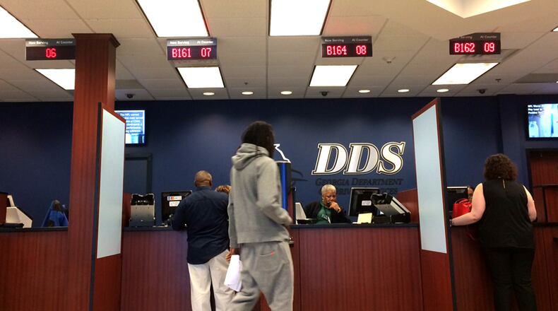 The Georgia Department of Drivers Services officials encourage customers to visit offices in the middle of the day and in the middle of the week for faster service. AJC FILE