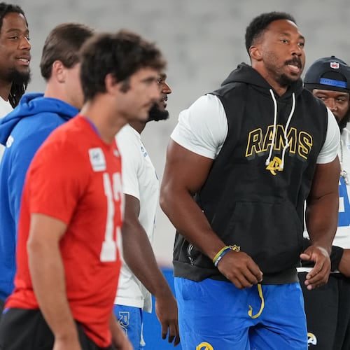 Los Angeles Rams outside linebacker Myles Garrett, centre, works out during a practice session for an NFL football game against the San Francisco 49ers., in Melbourne, Australia, Thursday, Sept. 10, 2026.(AP Photo/Asanka Brendon Ratnayake)