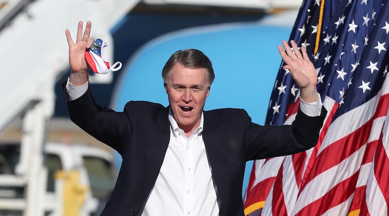 Then-Sen. David Perdue, R-Ga., arrives for Vice President Mike Pence's Defend the Majority Rally on Thursday, Dec. 10, 2020, in Augusta, Georgia. Perdue lost the runoff, but is expected to announce a bid for the Republican gubernatorial nomination. (Curtis Compton/Atlanta Journal-Constitution/TNS)