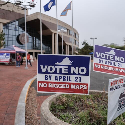 Voters walk outside the Fairfax County Government Center during early voting for the Virginia redistricting referendum, Friday, April 3, 2026, in Fairfax, Va. (AP Photo/Julia Demaree Nikhinson)