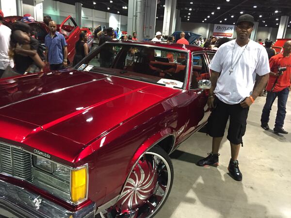 Barber Louis Lee of Atlanta nabbed this 1979 Oldsmobile for $1,500 and proceeded to pump $20,000 customizing it over the past four years. New sound system. 26-inch rims. The works. CREDIT: Rodney Ho/ rho@ajc.com
