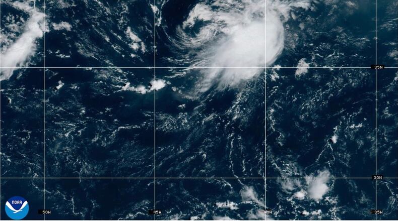 This NOAA satellite image taken at 11:21 a.m. EST on Wednesday, Aug. 12, 2026, shows Tropical Storm Cristobal in the Atlantic Ocean. (NOAA via AP)