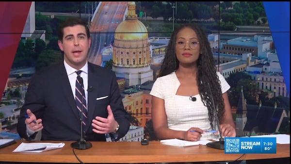 Nexstar debate moderators Zach Merchant and Faith Jessie. 