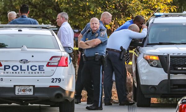 Gwinnett County police investigated the shooting Friday at an apartment complex on Chase Lane.