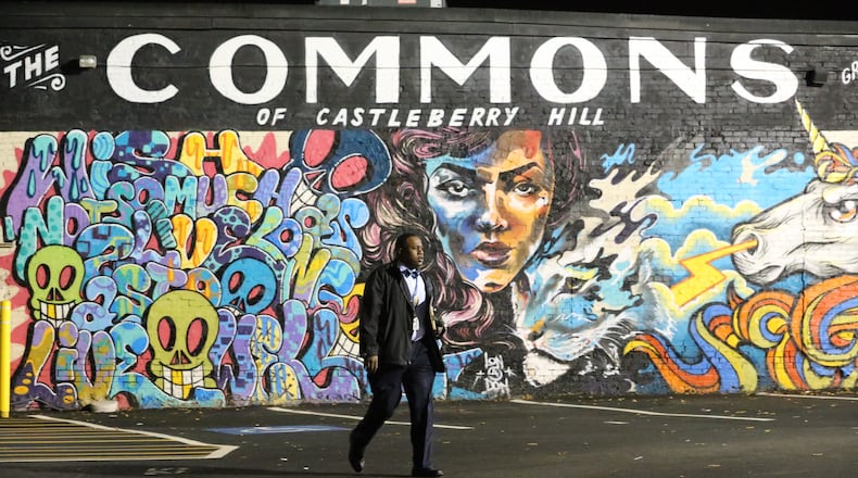 Police investigated the scene near where gunfire was exchanged Thursday morning.