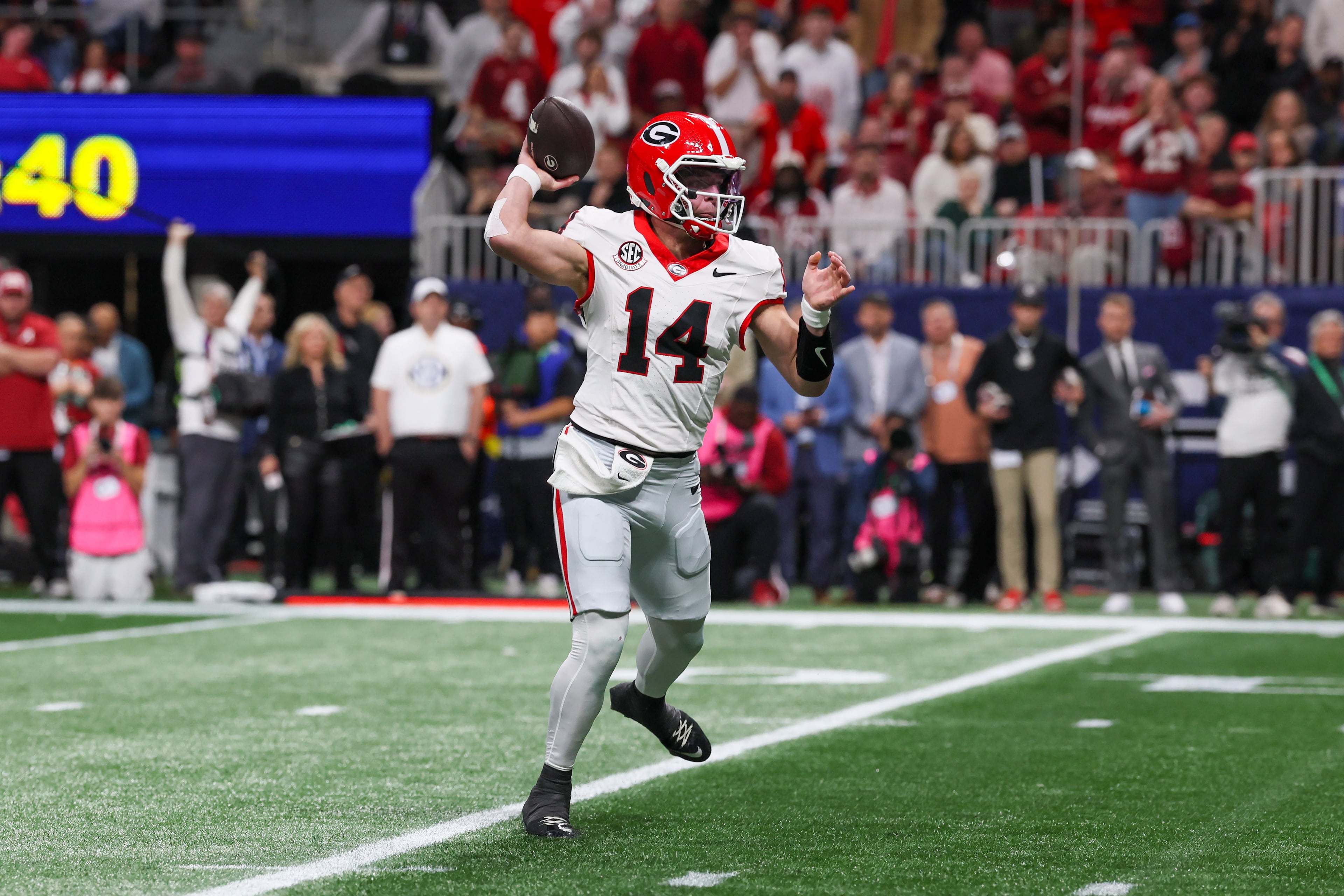 Georgia quarterback Gunner Stockton (14) throws downfield against Alabama during the first half of the SEC Championship game at Mercedes-Benz Stadium, Saturday, Dec. 6, 2025, in Atlanta. (Jason Getz / AJC)