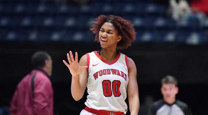 March 10, 2022 Macon - Woodward Academy's Sydney Bowles (0) gestures as she communicates with Woodward Academy's head coach Kim Lawrence (not pictured) during the 2022 GHSA State Basketball Class AAAAA Girls Championship game at the Macon Centreplex in Macon on Thursday, March 10, 2022. (Hyosub Shin / Hyosub.Shin@ajc.com)