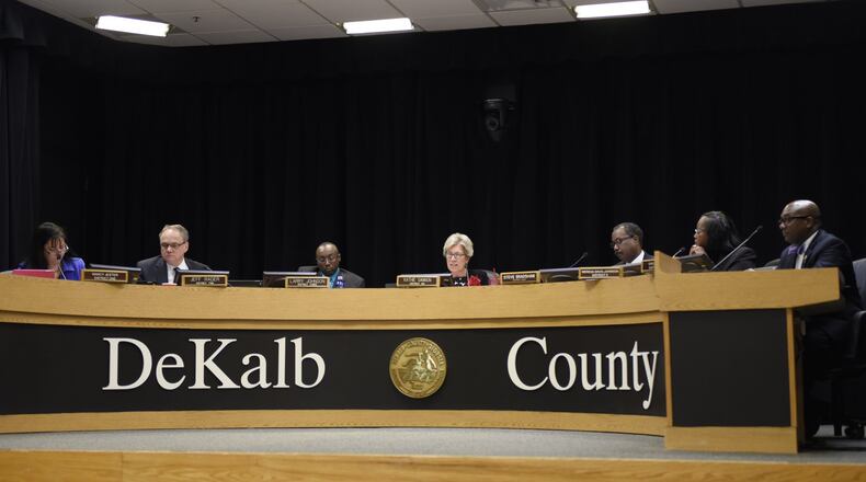 The DeKalb County Board of Commissioners votes on a plan to redevelop the General Motors plant located in Doraville during a meeting Tuesday. The motion was approved unanimously. (DAVID BARNES / DAVID.BARNES@AJC.COM)