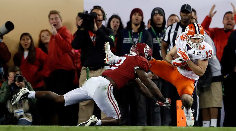 Clemson's Hunter Renfrow catches a touchdown pass in front of Alabama's Tony Brown during the second half of the NCAA college football playoff championship game Tuesday, Jan. 10, 2017, in Tampa, Fla. (AP Photo/John Bazemore)