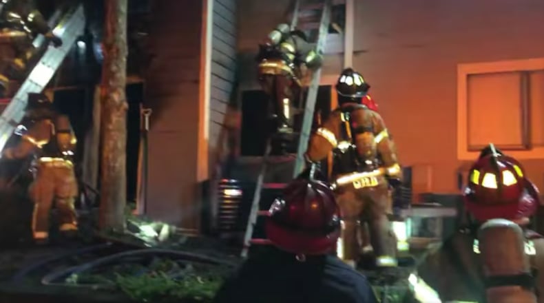 Authorities worked to put out a fire at the Chatsworth Apartments in the 4700 block of North Hill Parkway.