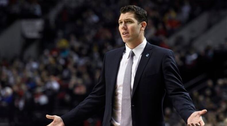 FILE - In this Jan. 8, 2016, file photo, Golden State Warriors assistant coach Luke Walton gestures during the first half of the team's NBA basketball game against the Portland Trail Blazers in Portland, Ore. The Los Angeles Lakers have reached an agreement with Walton to become their head coach. The Lakers made the announcement Friday night, April 29, 2016, five days after firing Byron Scott. (AP Photo/Steve Dykes, File)