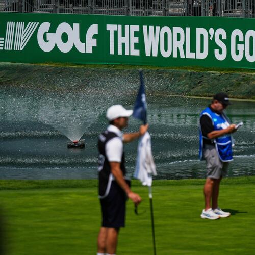 A caddie studies the putting green at the 18th hole during the first round of the LIV Golf tournament in Mexico City, Thursday, April 16, 2026. (AP Photo/Fernando Llano)