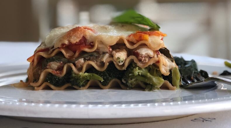 This veggie-packed dish offers memory-making flavors with only half the cheese of traditional lasagnas. PHOTO CREDIT: Kellie Hynes