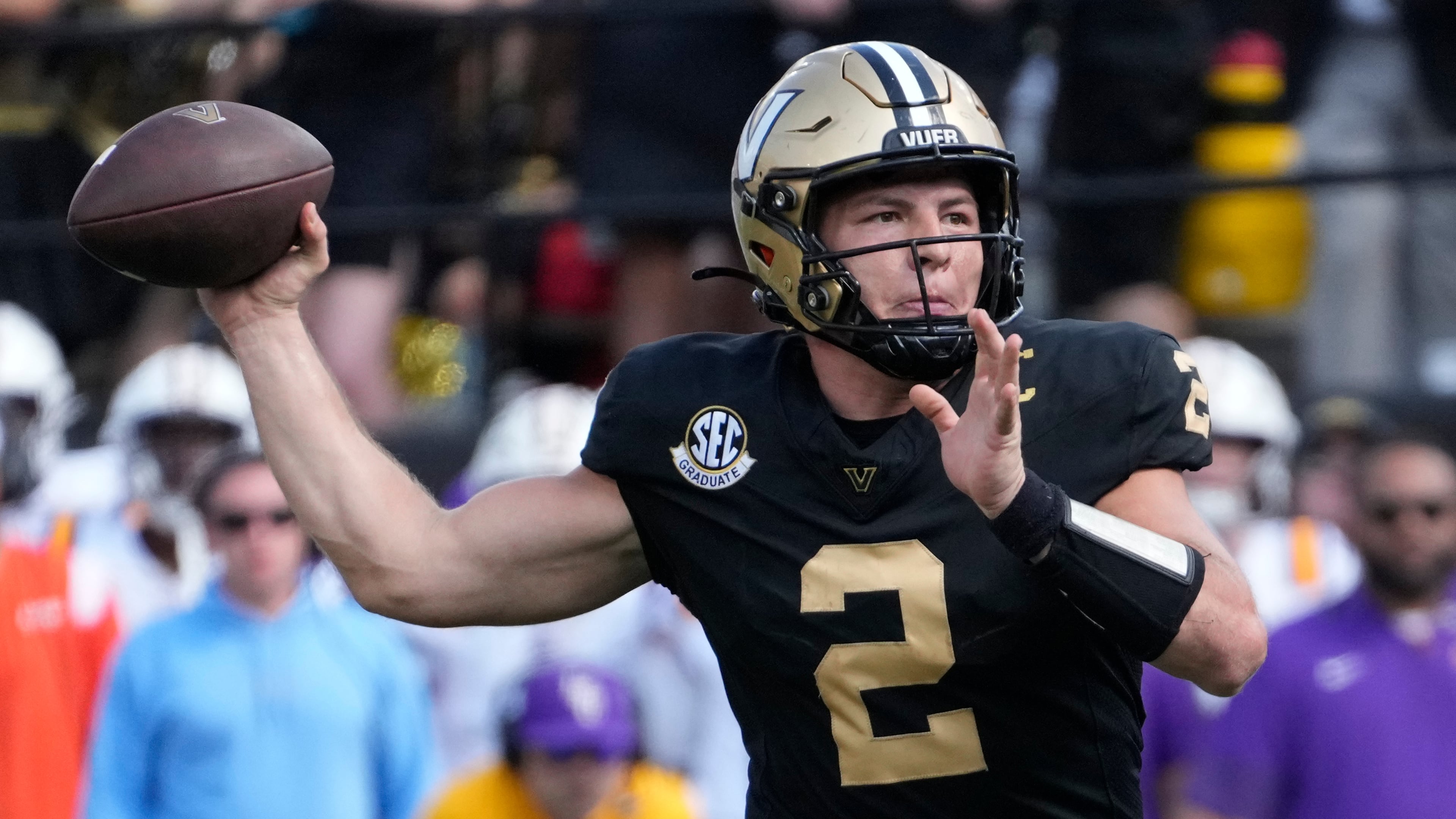 Vanderbilt quarterback Diego Pavia (2) looks to throw a pass during the second half of an NCAA college football game against LSU, Saturday, Oct. 18, 2025, in Nashville, Tenn. (AP Photo/George Walker IV)