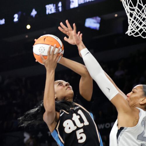 Dream All-Star Angel Reese (left) shoots against Aces center A’ja Wilson on Tuesday, Aug. 18, 2026, in Las Vegas. Reese made it hard for Wilson to get to her sweet spots with the ball, AJC columnist Michael Cunningham writes. (Steve Marcus/Las Vegas Sun via AP)